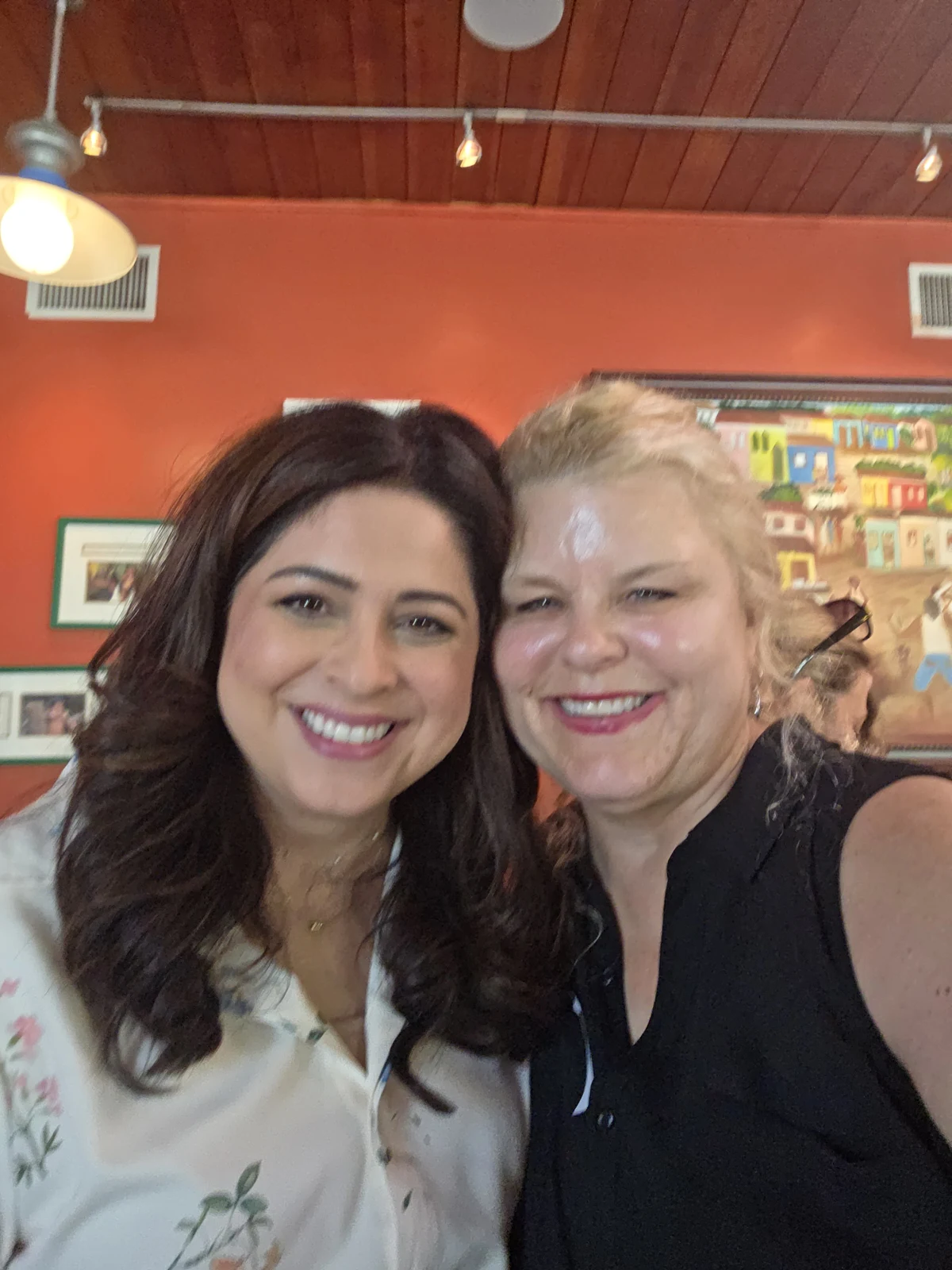 Lisa McCarthy and a community member together at an event